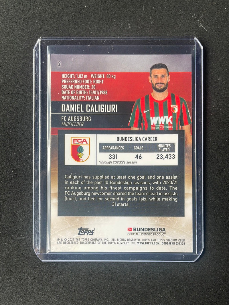 2021-22 Topps Bundesliga Stadium Club Chrome Daniel Caligiuri Orange/Yellow Wave Electric